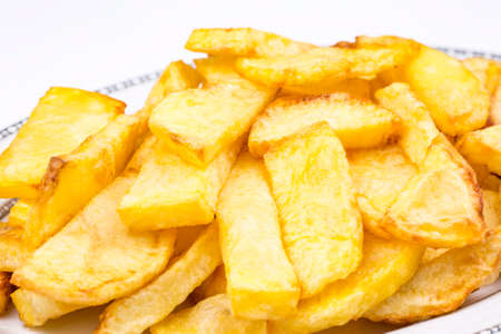 Turkish style fried potatoes on the white background.の写真素材