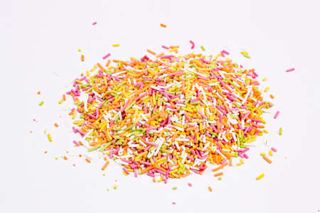 Colorful lollipops and different colored round candy. Top view.