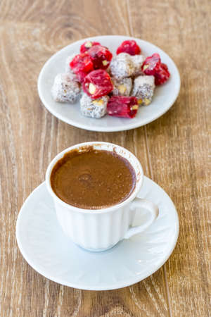 Turkish coffee with delight and traditional copper serving set