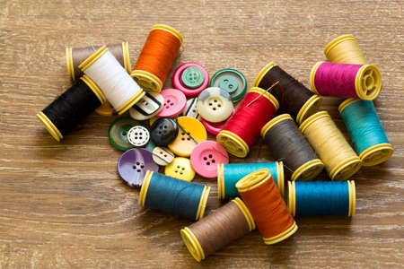 Tailor materials; colored spool rope and buttonsの写真素材