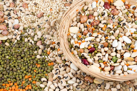 Legume abstract - top view of a variety of colorful bean, lentil and pea