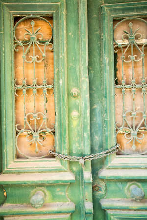 Closed Old vintage wood Door with door lockの写真素材