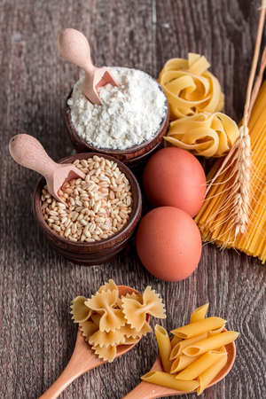 Raw food macaroni in kitchen. Food concept photo.