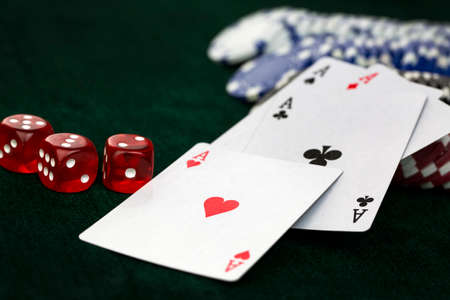 Person playing poker and looking at cards