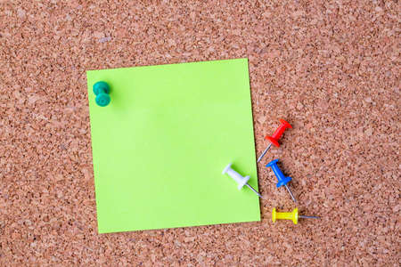 Collection of various note papers on corkboard