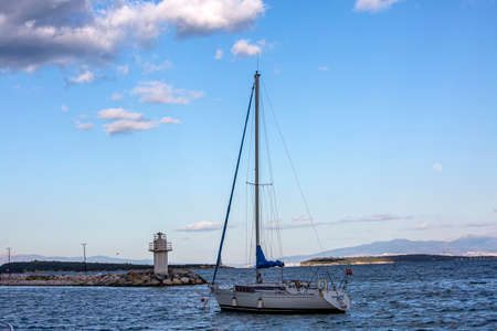 Sailboat in the bay of the Adriatic Sea in Croatiaの写真素材
