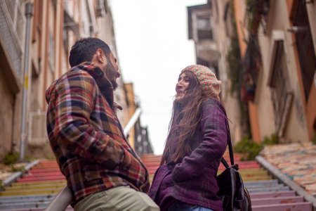 Young couple in love on the streets of the old city. Love story.の写真素材