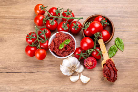 Fresh tomatoes and tomato paste