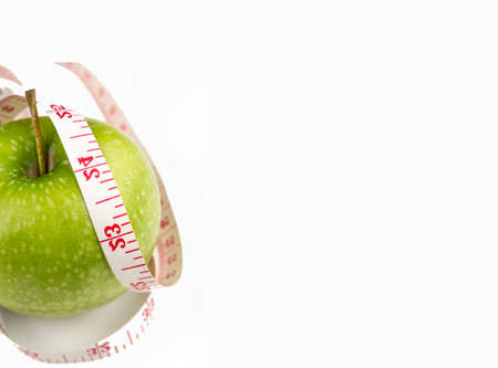 Red apple with measurement isolated on whiteの写真素材