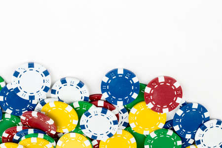 Ace playing cards with red dice. Casino betting and gambling concept and poker chips.の写真素材