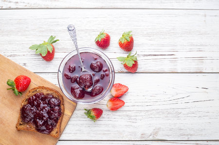 Bowl of strawberry jam isolated on white background from top viewの写真素材