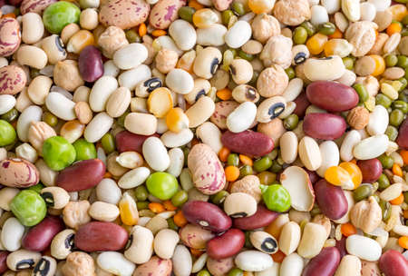 Mixed dried legumes and cereals isolated on white background, top viewの写真素材