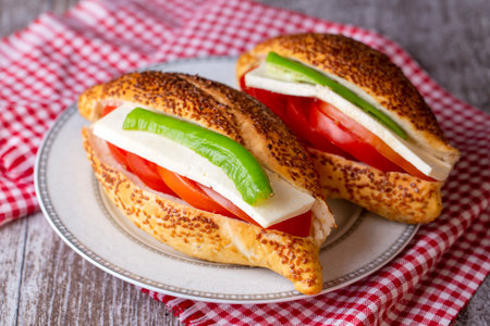 Turkish Bagel Simit with Tomato, Mozzarella and Green Pepperの写真素材
