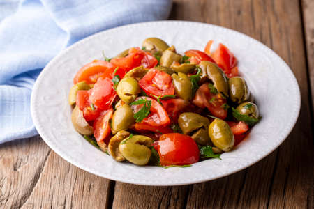 Gourmet flavors from traditional Turkish cuisine; green olive salad. A flavor belonging to the Turkey - Antakya region.の写真素材