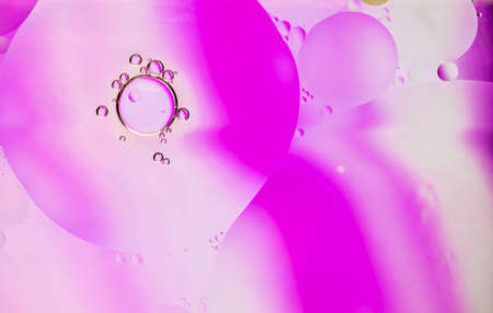 Abstract colorful Background Oil texture in Water surface with Bubbles micro shot close-up.の写真素材