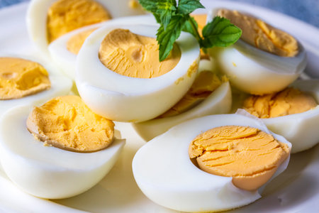 Boiled sliced egg, food photo