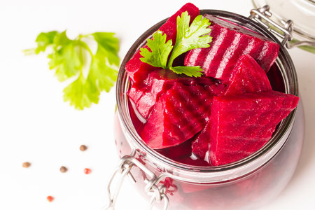 Sliced red beets in a jar - preparation of fermented. pickled beetrootの写真素材