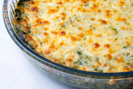 Baked Spinach with cheese delicious Italian food cuisine. Spinach gratin.の写真素材