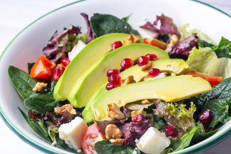 Fresh salad with chicken, tomatoes, spinach and avocado saladの写真素材