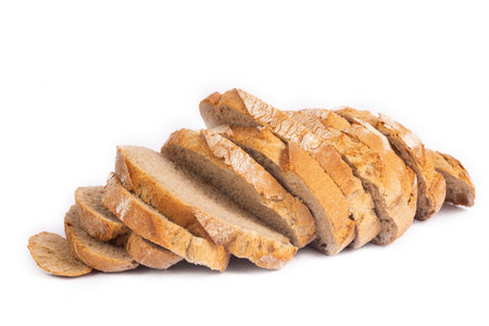 Loaf of sourdough bread isolated on a white background.