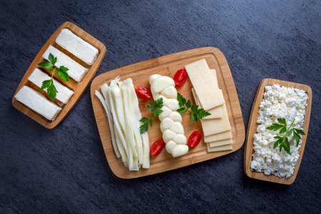 Traditional various cheeses, string, knitted and cecil cheese, turkish delicatessen conceptの写真素材