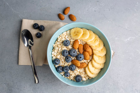 Oatmeal. With banana, blueberry and almond for healthy breakfast or lunch. Healthy diet nutrition.