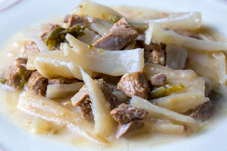 Close up of a bowl of chinese noodle soup with beef