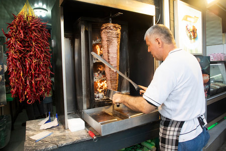 Izmir - Turkey, 18 June, 2023, Turkey street delicacies, doner masterのeditorial素材