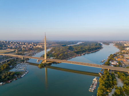 View of Ada Ciganlija from aerial drone and Most na Adi bridge over Sava River. Belgrade - Serbiaのeditorial素材