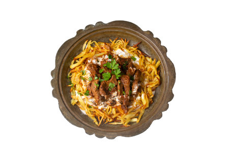 Turkish food; Cokertme Kebab - Beef meat kebab with yoghurt and french fries