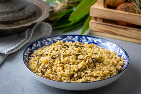 Herbed bulgur pilaf. "Keledos and Ciris herbed" bulgur from Van region of Turkey. Turkish name; Bulgur pilaf with herbsの写真素材