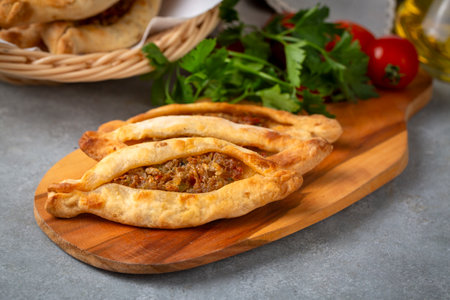 Dishes from traditional Turkish cuisine; Mini pita with minced meat - Turkish name; Minced meat mini pitaの写真素材