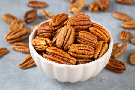 Tasty pecan nuts in bowl