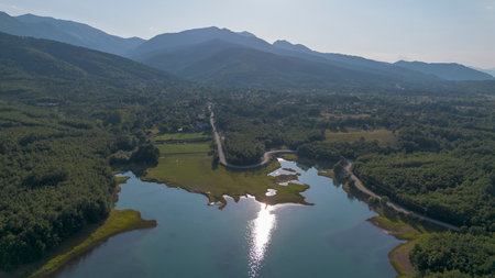 Plastiras Dam, an arch dam in the Karditsa regional union of Greece, which flows into the Tavropos River, forming the artificial Plastiras lake.の写真素材