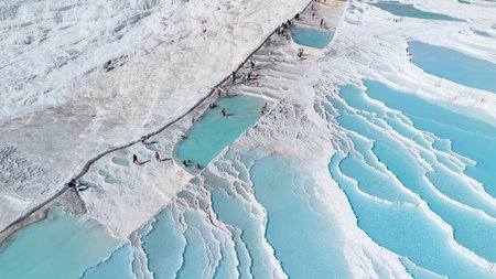 Aerial view Pamukkale Turkey travertine pools, nature terraces with blue water.の写真素材