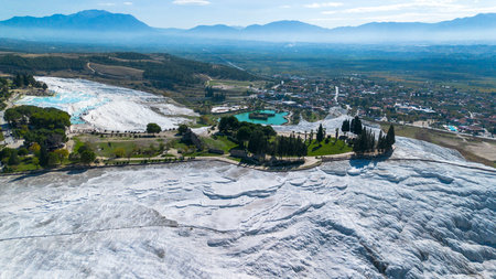 Aerial top view Pamukkale Turkey travertine pools, nature terraces with blue water.の写真素材