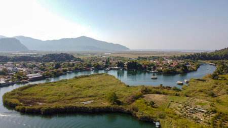 Dalyan - Mugla - Turkey, October 22, 2024, Beautiful Dalyan river view from the rock-cut temple tombs of the ancient city of Kaunos.の写真素材