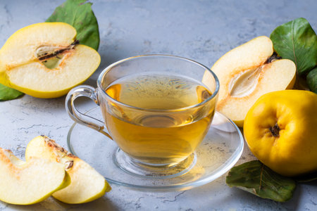 Quince tea and fresh quince fruitの写真素材