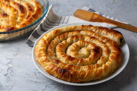 Turkish Tray Boregi, Round Borek, Tray pastry (Turkish name; rol borek - spinach borek)の写真素材