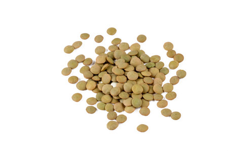 Dried green lentils on a white background.の写真素材