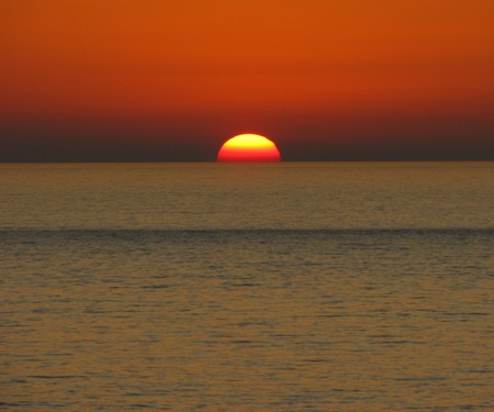 Sunset over Golden Bay (Malta)の写真素材