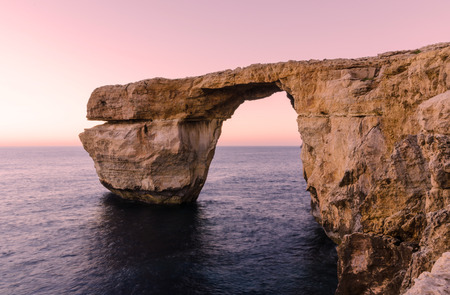 Sunset over the Azure Window in Dwejra - Gozoの写真素材