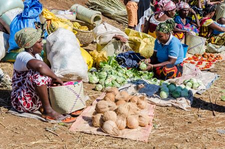 Unidentified Madagascar women selling vegetables in a marketのeditorial素材