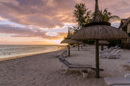 Beautiful sunset on a sandy beach in Mauritiusの写真素材