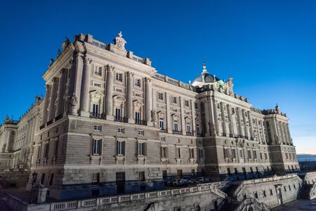 Evening at the Royal Palace in Madrid, Spain. The brilliant white stone of the north faÃÂ§ade of the Royal Palace of Madridのeditorial素材