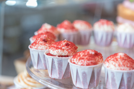 Cream mini cupcakes sold at Borough Market in London, UKの写真素材