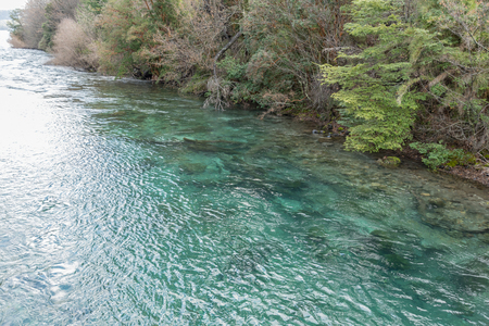 Clear waters of Lago Correntoso in Neuquen Province, Argentinaの写真素材