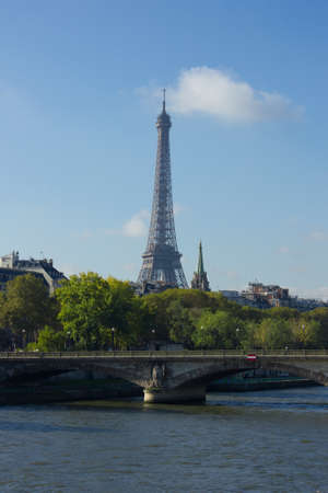 View of Seine, Paris, with Eiffel tower and Pont des Invalides in background 