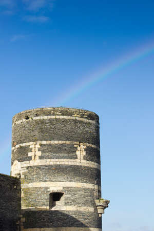Towers of castle of Angers under rainbow, France のeditorial素材