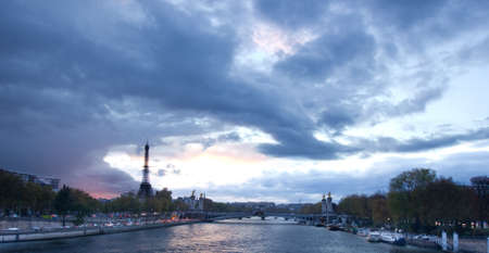 sunset panoramic view of Eiffel Tower with Alexander the Third bridge, Paris, as seen from Seine in Van Gogh styleの写真素材